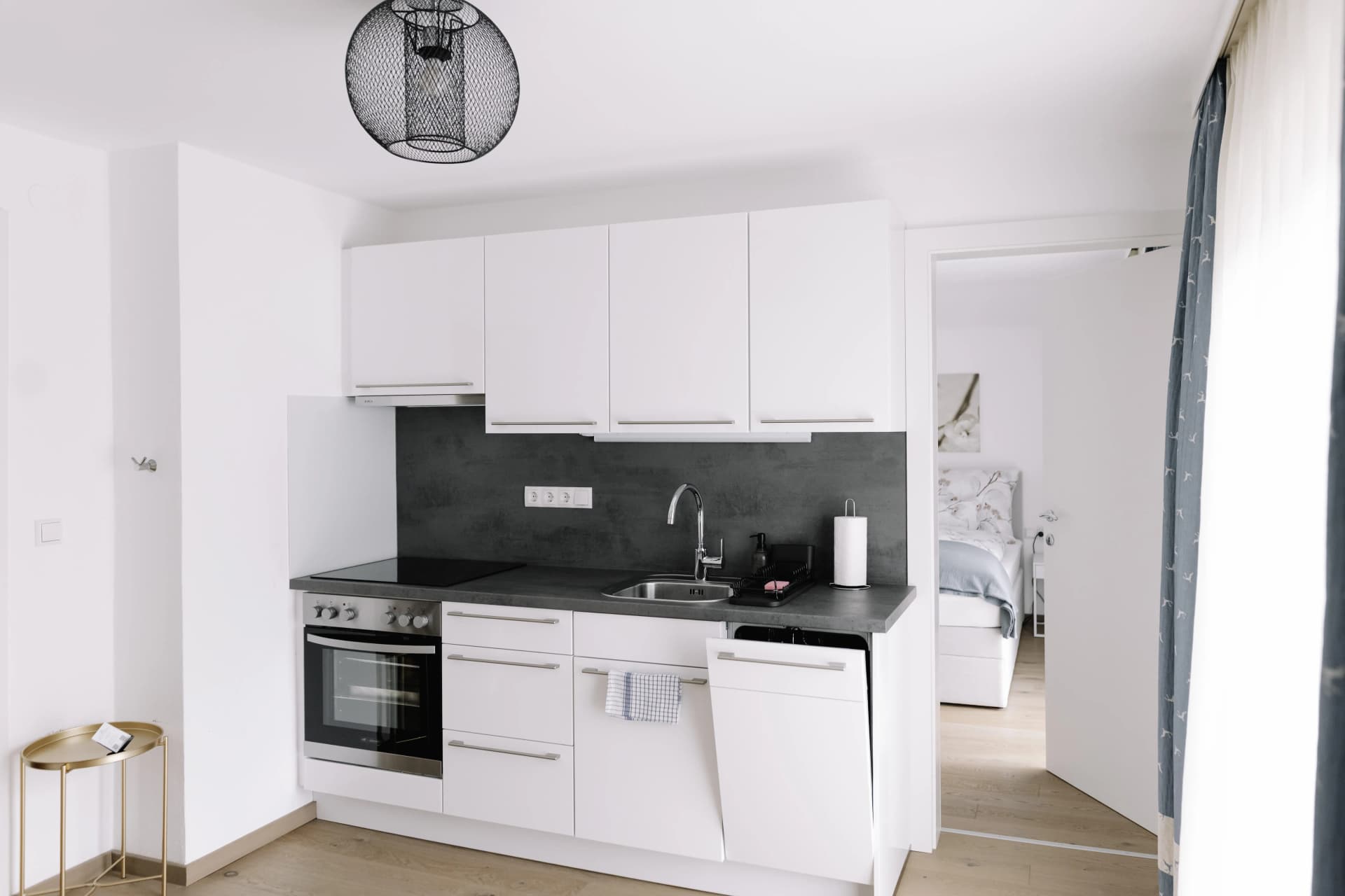 Haus Montis apartment exterior with stunning mountain backdrop in Haus im Ennstal, Austria